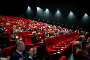 public lors d'une conférence dans une salle de cinéma prise par un photographe de conférénce à Carré Sénart (77)